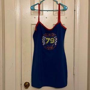 Spaghetti strap dress. Stretches color is blue red white and yellow. USA